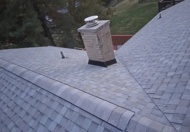 Completed shingles and chimney flashing at the Foxpoint Drive project in Maryland Heights