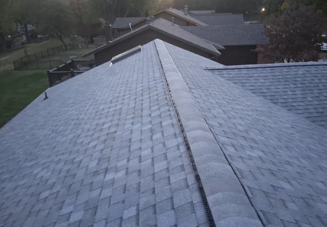 Completed shingle roof and ridge ventilation on Foxpoint Drive in Maryland Heights